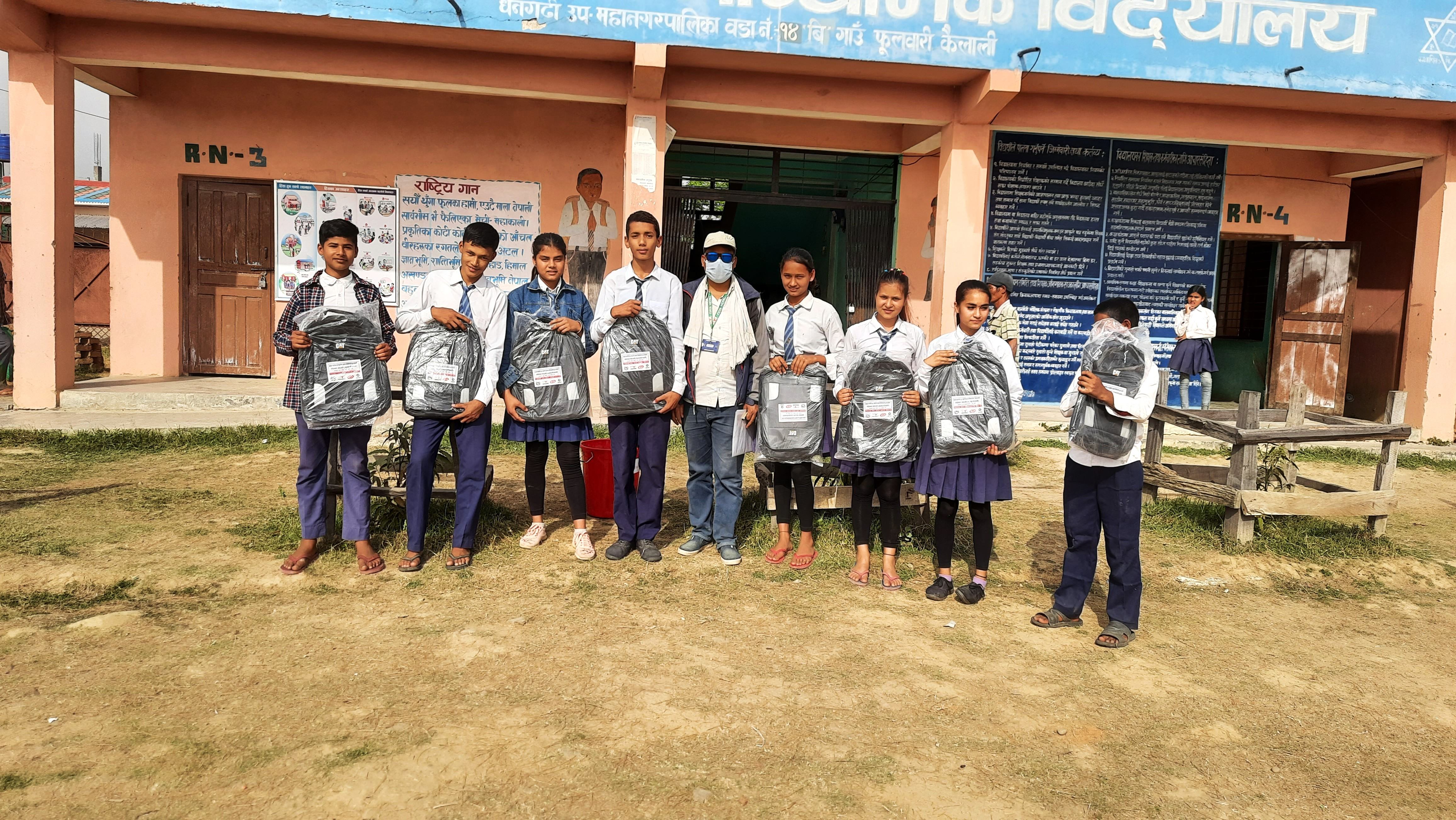Distribution of school bags to students