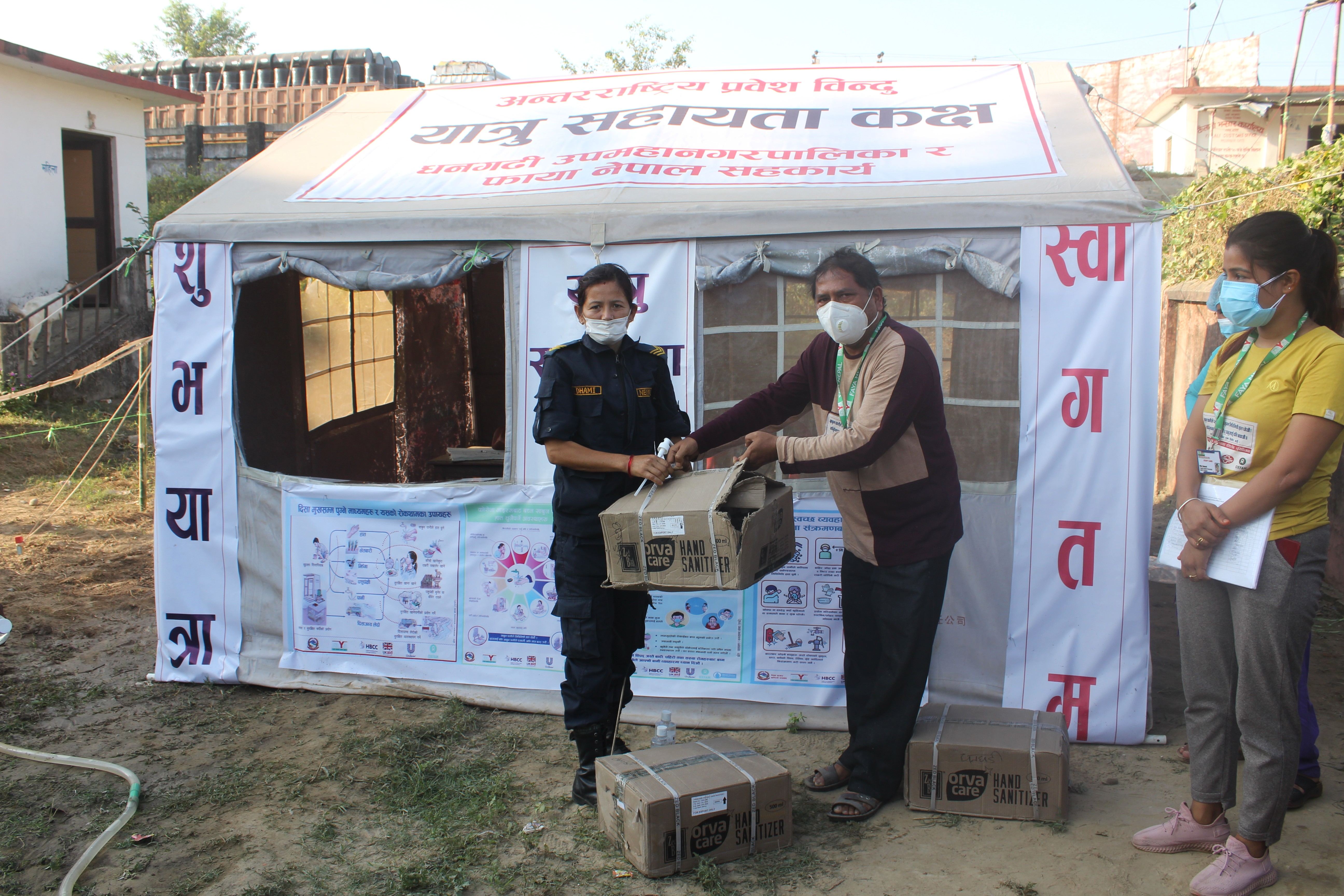 Hand sanitizer distribution to police personnel at Bhansar during the COVID-19 pandemic